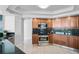 Modern kitchen with stainless steel appliances and granite countertops at 888 Blvd Of The Arts # 1408, Sarasota, FL 34236