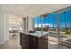 Modern kitchen with stainless steel island at 888 Blvd Of The Arts # 1408, Sarasota, FL 34236
