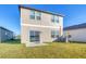 Two-story home with backyard and patio at 10611 Ladybug Cv, Parrish, FL 34219