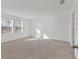 Large bedroom with neutral wall and carpet flooring at 10611 Ladybug Cv, Parrish, FL 34219