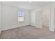 Well-lit bedroom featuring a walk-in closet at 10611 Ladybug Cv, Parrish, FL 34219