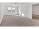 Spacious bedroom with carpeted floor and large windows at 10611 Ladybug Cv, Parrish, FL 34219