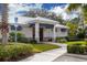Community clubhouse with accessible entrance and landscaping at 10611 Ladybug Cv, Parrish, FL 34219