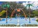 Colorful spray park with fun, interactive water features at 10611 Ladybug Cv, Parrish, FL 34219