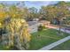 Single-Gathering home with mature landscaping and circular driveway at 1100 27Th W Ave, Palmetto, FL 34221