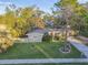 Single-Gathering home with mature landscaping and circular driveway at 1100 27Th W Ave, Palmetto, FL 34221