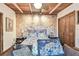 Serene bedroom with a tranquil mural and plush seating at 1100 27Th W Ave, Palmetto, FL 34221