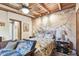 Relaxing bedroom, showcasing a tranquil mural and wooden ceiling at 1100 27Th W Ave, Palmetto, FL 34221