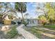 House exterior showcasing a gray home and brick pathway at 1100 27Th W Ave, Palmetto, FL 34221
