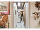 Hallway with access to bathroom and other rooms at 1100 27Th W Ave, Palmetto, FL 34221