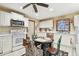 Kitchen with white cabinets, stainless steel appliances, and breakfast nook at 1100 27Th W Ave, Palmetto, FL 34221