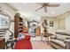 Open concept living room with a view of the kitchen and unique decor at 1100 27Th W Ave, Palmetto, FL 34221