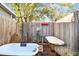 Two clawfoot tubs in a bamboo-fenced outdoor patio at 1100 27Th W Ave, Palmetto, FL 34221