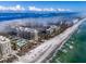 Aerial view showing beachfront property and ocean at 1211 Gulf Of Mexico Dr # 403, Longboat Key, FL 34228