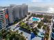 Aerial view of building, pool, and beach location at 1211 Gulf Of Mexico Dr # 403, Longboat Key, FL 34228