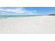 Expansive white sand beach with calm ocean waters at 1211 Gulf Of Mexico Dr # 403, Longboat Key, FL 34228