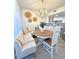 Charming dining area with wooden table and built in bench at 1211 Gulf Of Mexico Dr # 403, Longboat Key, FL 34228