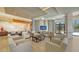 Spacious lobby with comfortable seating and a large TV at 1211 Gulf Of Mexico Dr # 403, Longboat Key, FL 34228