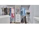 Spacious walk-in closet with ample hanging space and shelving at 1211 Gulf Of Mexico Dr # 403, Longboat Key, FL 34228