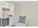 Convenient wet bar with wine cooler and comfortable seating area at 1211 Gulf Of Mexico Dr # 403, Longboat Key, FL 34228