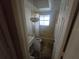 Bathroom with shower, toilet and a vanity at 1346 Kenmore St, Port Charlotte, FL 33952