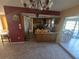 Kitchen with a breakfast bar and chandelier at 1346 Kenmore St, Port Charlotte, FL 33952