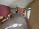 Spacious living room with tiled floors at 1346 Kenmore St, Port Charlotte, FL 33952