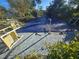 Backyard pool with safety cover, needs some TLC at 1346 Kenmore St, Port Charlotte, FL 33952
