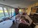Sunroom with tiled floor and lots of windows at 1346 Kenmore St, Port Charlotte, FL 33952
