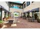 Charming community courtyard with ample seating and shade at 1447 Allegheny Ln, North Port, FL 34286