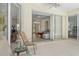 Covered lanai with sliding doors leading to the living room at 1447 Allegheny Ln, North Port, FL 34286