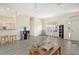 Open living area with hardwood floors and a view to kitchen at 1447 Allegheny Ln, North Port, FL 34286