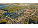 Aerial view of community amenities, including tennis courts at 17607 Gawthrop Dr # 103, Bradenton, FL 34211