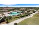 Resort-style pool, clubhouse, and lush landscaping at 17607 Gawthrop Dr # 103, Bradenton, FL 34211