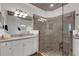 Bathroom with a large walk-in shower and modern fixtures at 17607 Gawthrop Dr # 103, Bradenton, FL 34211