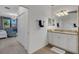 Spa-like bathroom with a walk-in shower and double vanity at 17607 Gawthrop Dr # 103, Bradenton, FL 34211