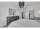 Bright bedroom with a dresser and large closet at 17607 Gawthrop Dr # 103, Bradenton, FL 34211