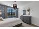 Bedroom with blue floral wallpaper and full bed at 17607 Gawthrop Dr # 103, Bradenton, FL 34211