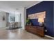 Spacious entryway, showcasing a console table and a view into the dining area at 17607 Gawthrop Dr # 103, Bradenton, FL 34211