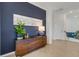 Elegant entryway with dark wood console table and statement art at 17607 Gawthrop Dr # 103, Bradenton, FL 34211
