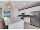 Modern kitchen with stainless steel appliances and granite countertops at 17607 Gawthrop Dr # 103, Bradenton, FL 34211