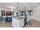 Modern kitchen with a large island and stainless steel appliances at 17607 Gawthrop Dr # 103, Bradenton, FL 34211