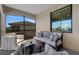 Relaxing screened balcony with seating and a view at 17607 Gawthrop Dr # 103, Bradenton, FL 34211