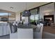 Spacious screened balcony with seating and view at 17607 Gawthrop Dr # 103, Bradenton, FL 34211
