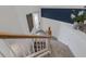 View from the top of the stairs, showcasing a stylish entryway at 17607 Gawthrop Dr # 103, Bradenton, FL 34211