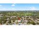 Aerial view of a house and surrounding neighborhood, showcasing the property's location and landscape at 1790 Ezelle Ave, Largo, FL 33770