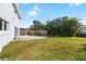 Backyard with patio and lush landscaping at 1790 Ezelle Ave, Largo, FL 33770