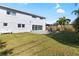 Backyard with patio and lawn at 1790 Ezelle Ave, Largo, FL 33770