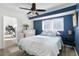 Cozy bedroom with ceiling fan, and access to home gym at 1790 Ezelle Ave, Largo, FL 33770