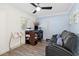 Home office with built-in shelving, desk and comfortable seating at 1790 Ezelle Ave, Largo, FL 33770